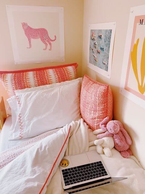 Preppy college dorm with pink posters