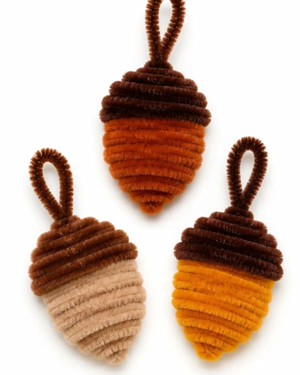 Rustic pipe cleaner acorns in warm autumn colors