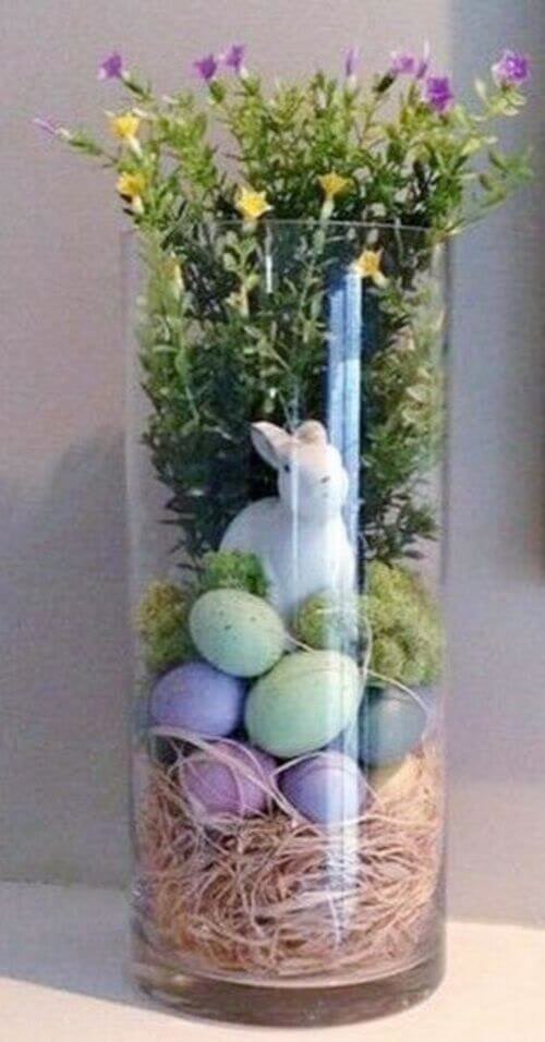Straw, eggs and moss glass fillers with small bunnies