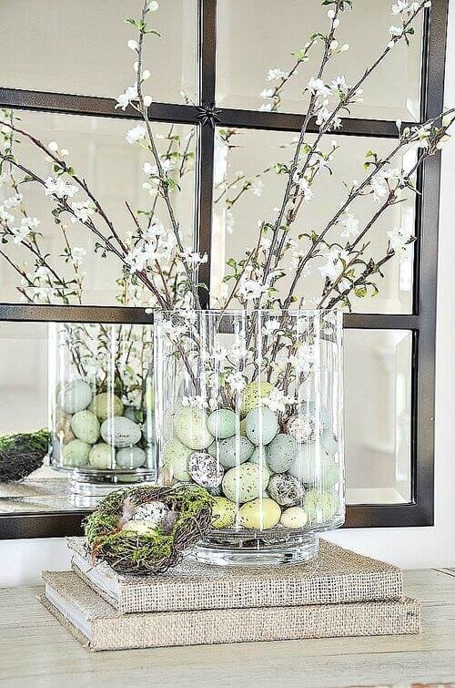 Colored eggs as vase fillers with fake trees