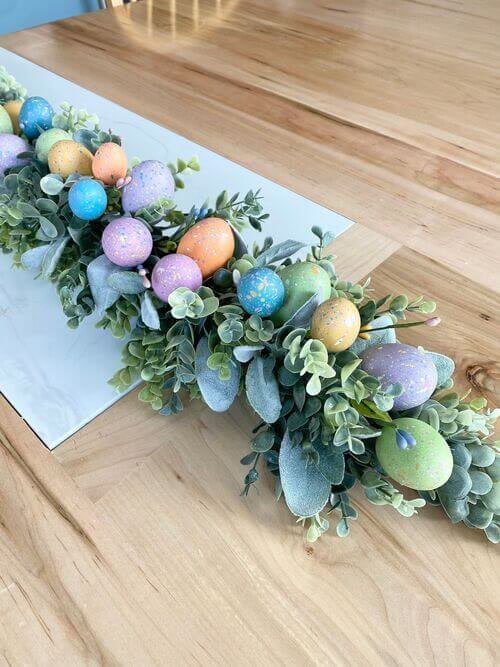 Colored eggs and greenery table runner