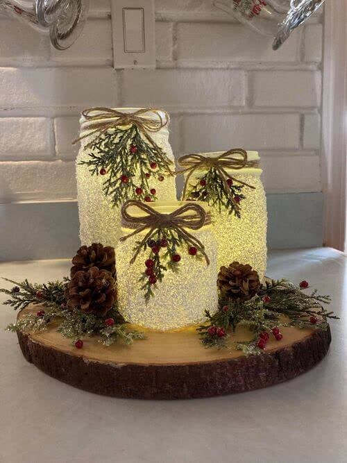 DIY mason jar centerpiece with snowy glitter